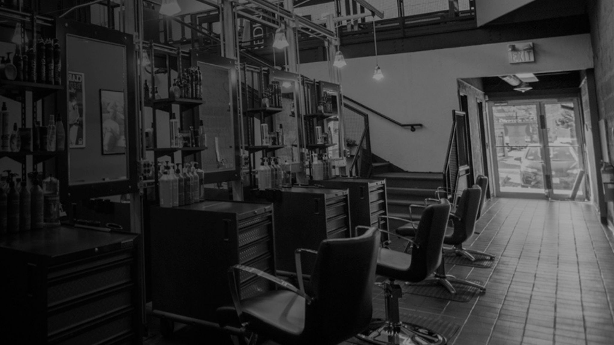 Salon clinic floor at Debutantes School of Beauty in DeKalb Illinois where cosmetology students train with real clients.