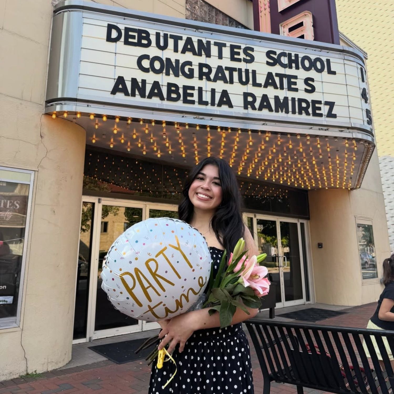 Anabelia Ramirez celebrating her graduation from the esthetics program at Debutantes School of Beauty in DeKalb Illinois.